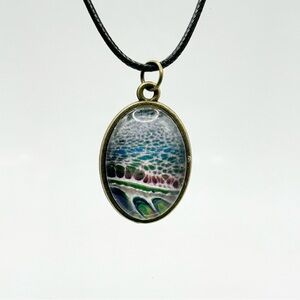 Oval Pendant Necklace with Artistic Design